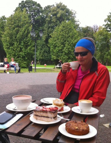 Salme relaxing with coffee and a few cakes.